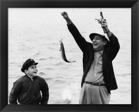 Framed 1950s 1960s Boy Fishing With Father Or Grandfather Print