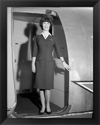 Framed 1960s Smiling Stewardess Standing In Doorway Print