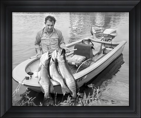 Framed 1970s Man In Small Motorboat Print