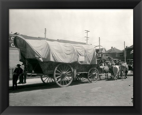 Framed 1920s Ox Drawn Conestoga Covered Wagon Print