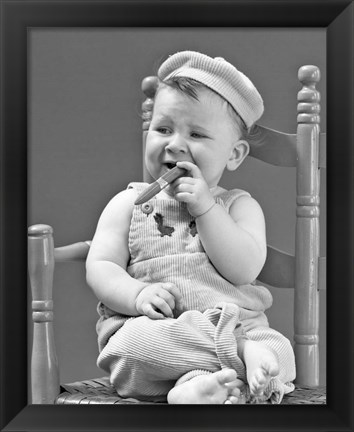 Framed 1940s Baby Sitting Chair Holding Cigar Print