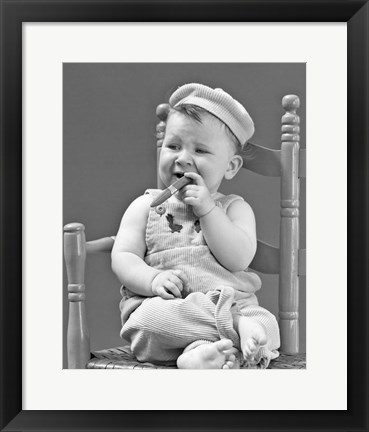 Framed 1940s Baby Sitting Chair Holding Cigar Print