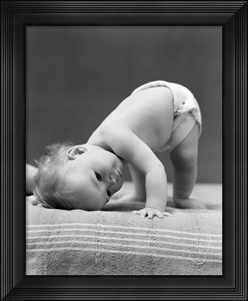 Framed 1940s Baby Bending Down With Head On Blanket Print