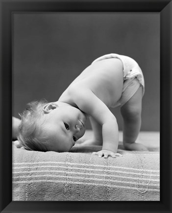 Framed 1940s Baby Bending Down With Head On Blanket Print