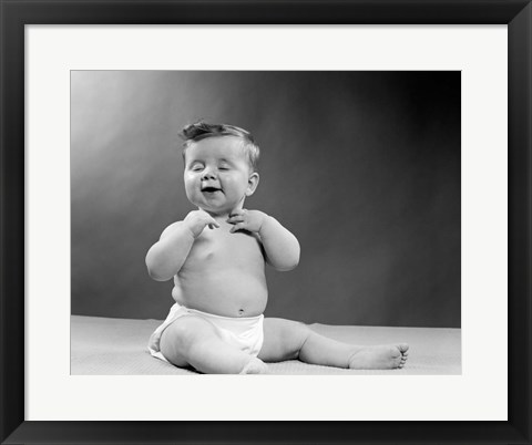 Framed 1950s Baby Seated With Eyes Closed Print