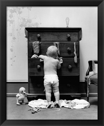 Framed 1940s Toddler Baby Pulling Clothes Out Of Bureau Print