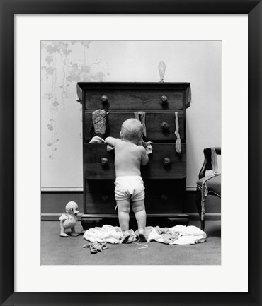 Framed 1940s Toddler Baby Pulling Clothes Out Of Bureau Print