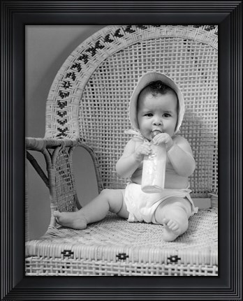 Framed 1940s Baby Sitting In Wicker Chair Print