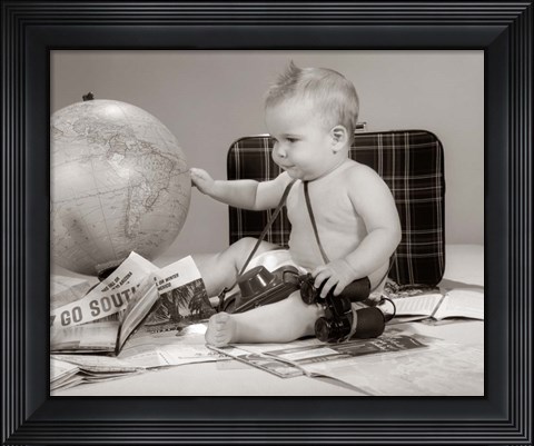 Framed 1960s Baby Seated Looking At Globe Print