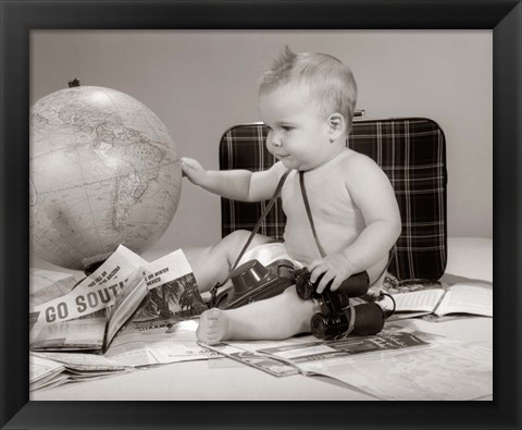 Framed 1960s Baby Seated Looking At Globe Print