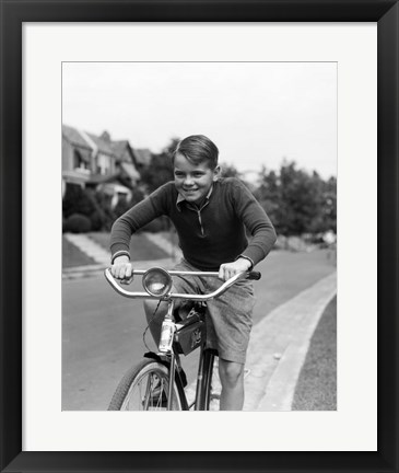 Framed 1930s Smiling Boy Riding Bicycle Print