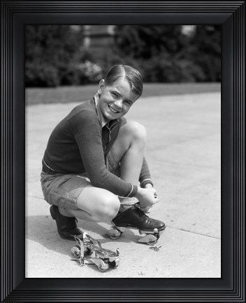 Framed 1930s Smiling Boy Fastening On Metal Roller Skates Print