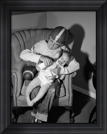 Framed 1950s 1960s Boy Sitting By Football Print