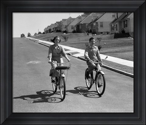 Framed 1950s Teen Boy Girl Couple Riding Bikes Print