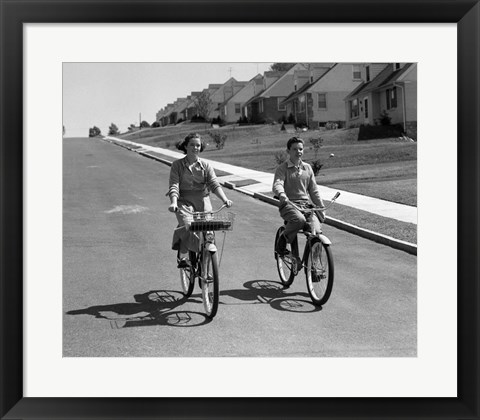 Framed 1950s Teen Boy Girl Couple Riding Bikes Print