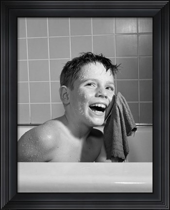 Framed 1950s 1960s Boy Washing Face Sitting In Bathtub Print