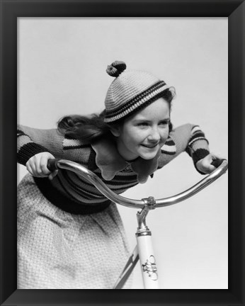 Framed 1930s Smiling Eager Little Girl In Knit Cap And Sweater Riding Bike Print