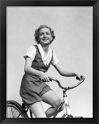 Framed 1930s Smiling Blonde Woman Riding Bicycle Print