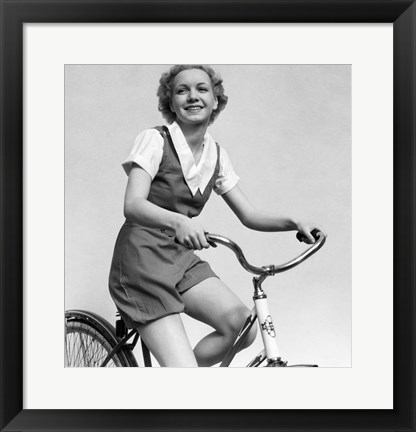 Framed 1930s Smiling Blonde Woman Riding Bicycle Print