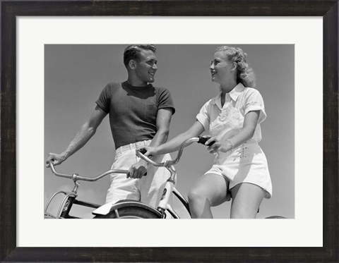 Framed 1930s 1940s Smiling Couple On Bikes Looking At One Another Print