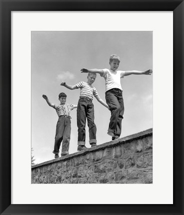 Framed 1950s Three Laughing Boys Walking On Top Of Stone Wall Print