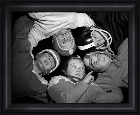 Framed 1960s Five Boys In Huddle Wearing Helmets &amp; Football Jerseys Print
