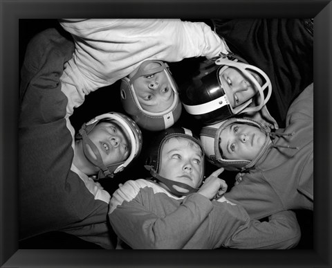 Framed 1960s Five Boys In Huddle Wearing Helmets &amp; Football Jerseys Print