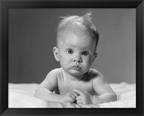 Framed 1960s Baby Lying On Stomach With Messy Hair Print