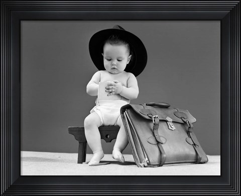 Framed 1940s Baby In Fedora Seated On Stool Print