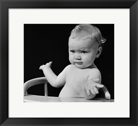 Framed 1930s 1940s Baby In High Chair Making Shrugging Gesture Print