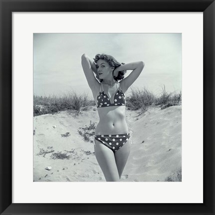 Framed 1950s Brunette Beauty In Polka Dot Bikini Standing In Sand Print