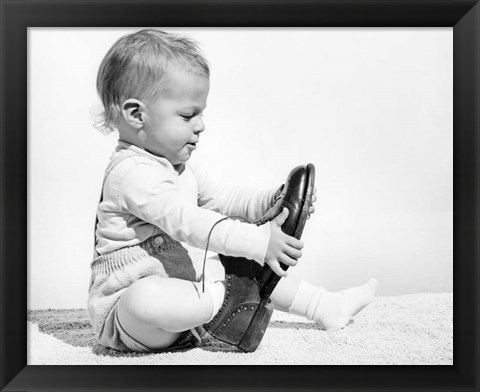 Framed 1960s Baby Boy Trying To Put On Man&#39;S Shoe Print