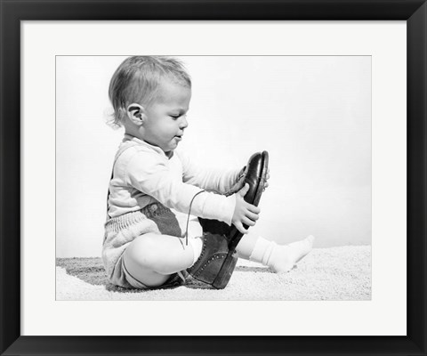 Framed 1960s Baby Boy Trying To Put On Man&#39;S Shoe Print