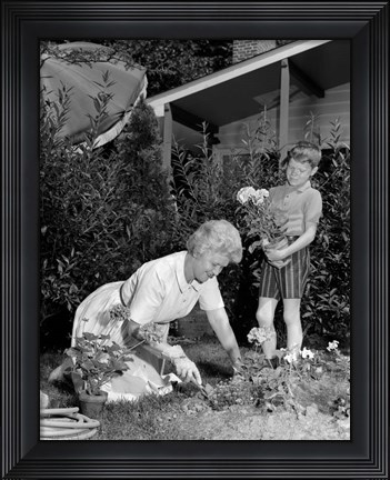 Framed 1960s Boy Helping Grandmother Plant Flowers Print