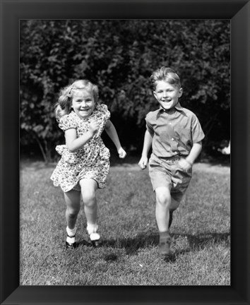 Framed 1930s 1940s Boy And Girl Running In Backyard Print