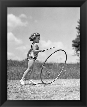 Framed 1930s Girl Outdoors Playing Hoop And Stick Game Print